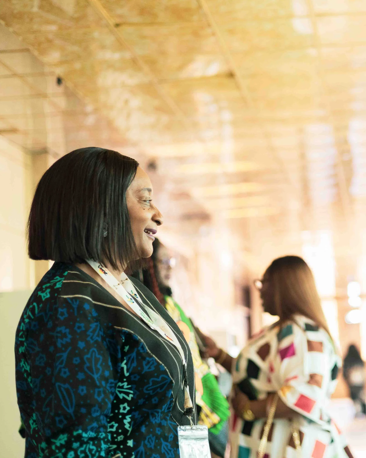 Halima Oyelade in a professional conversation